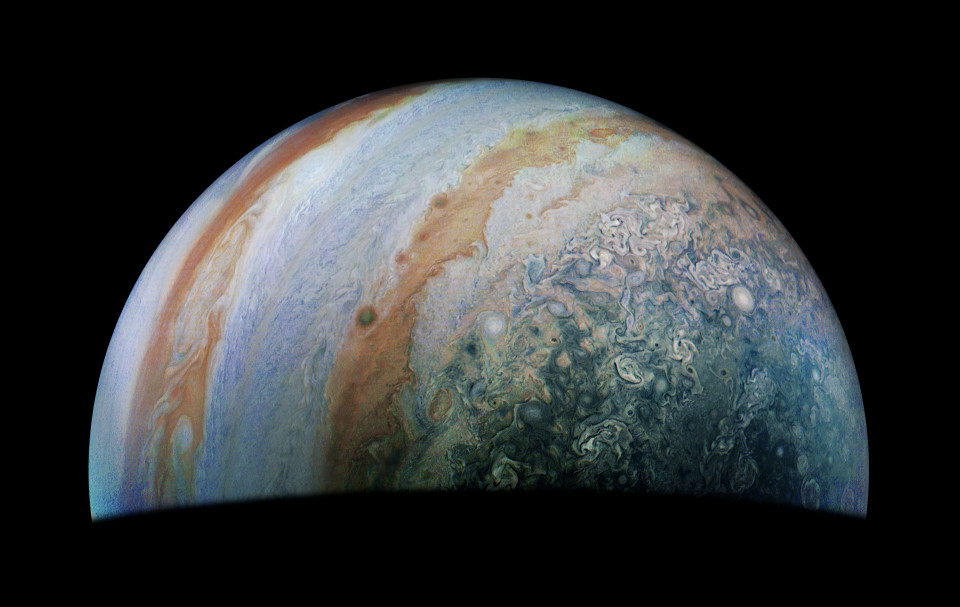 The limb of Jupiter with the terminator across the bottom