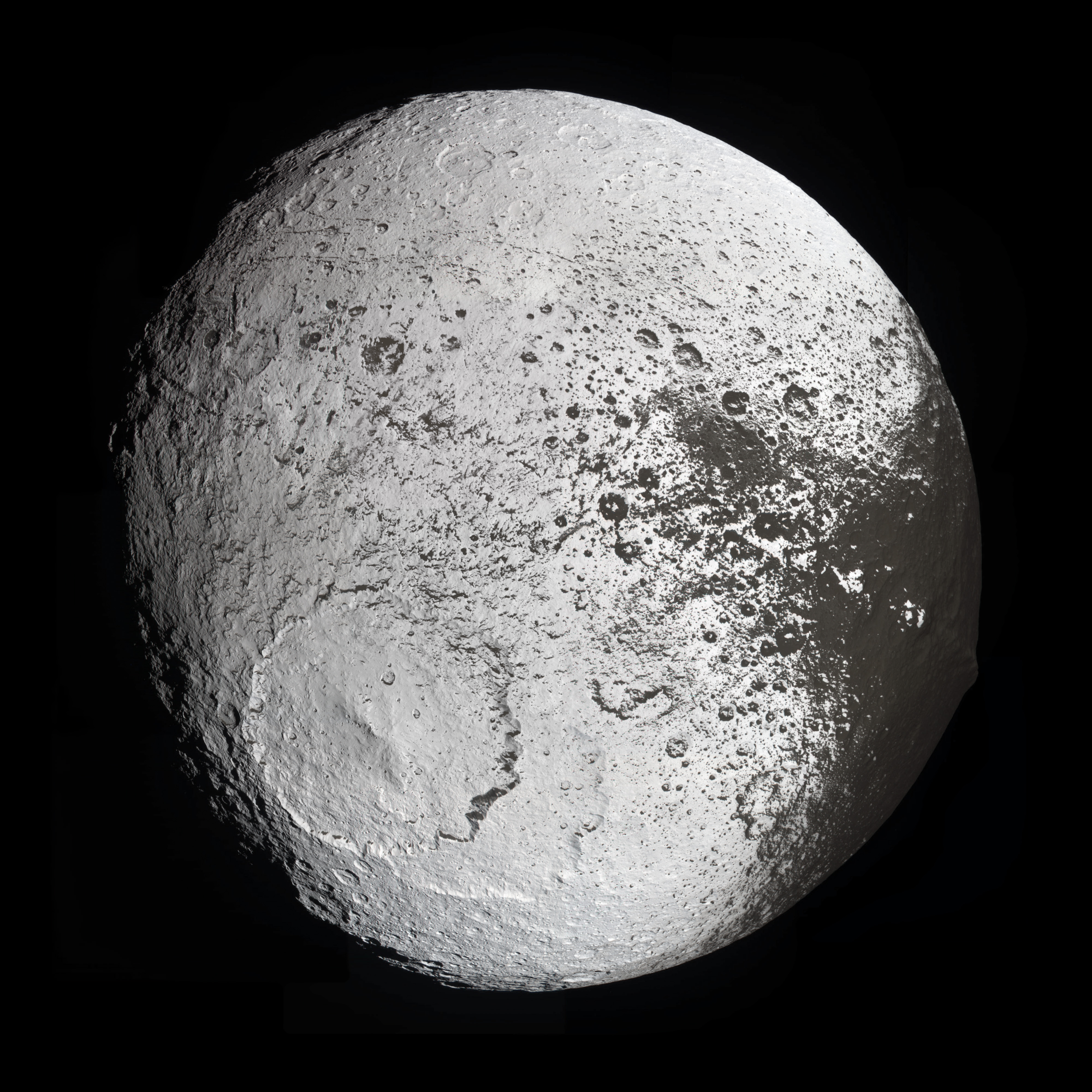 Iapetus, its bright trailing hemisphere