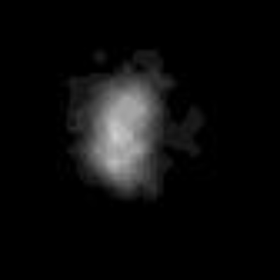 Nereid, barely resolved: a faint irregular smudge