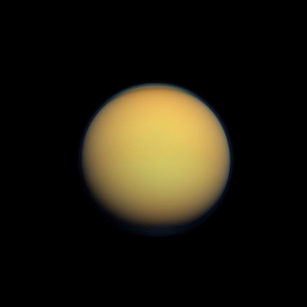 Titan in visible light: a featureless orange ball