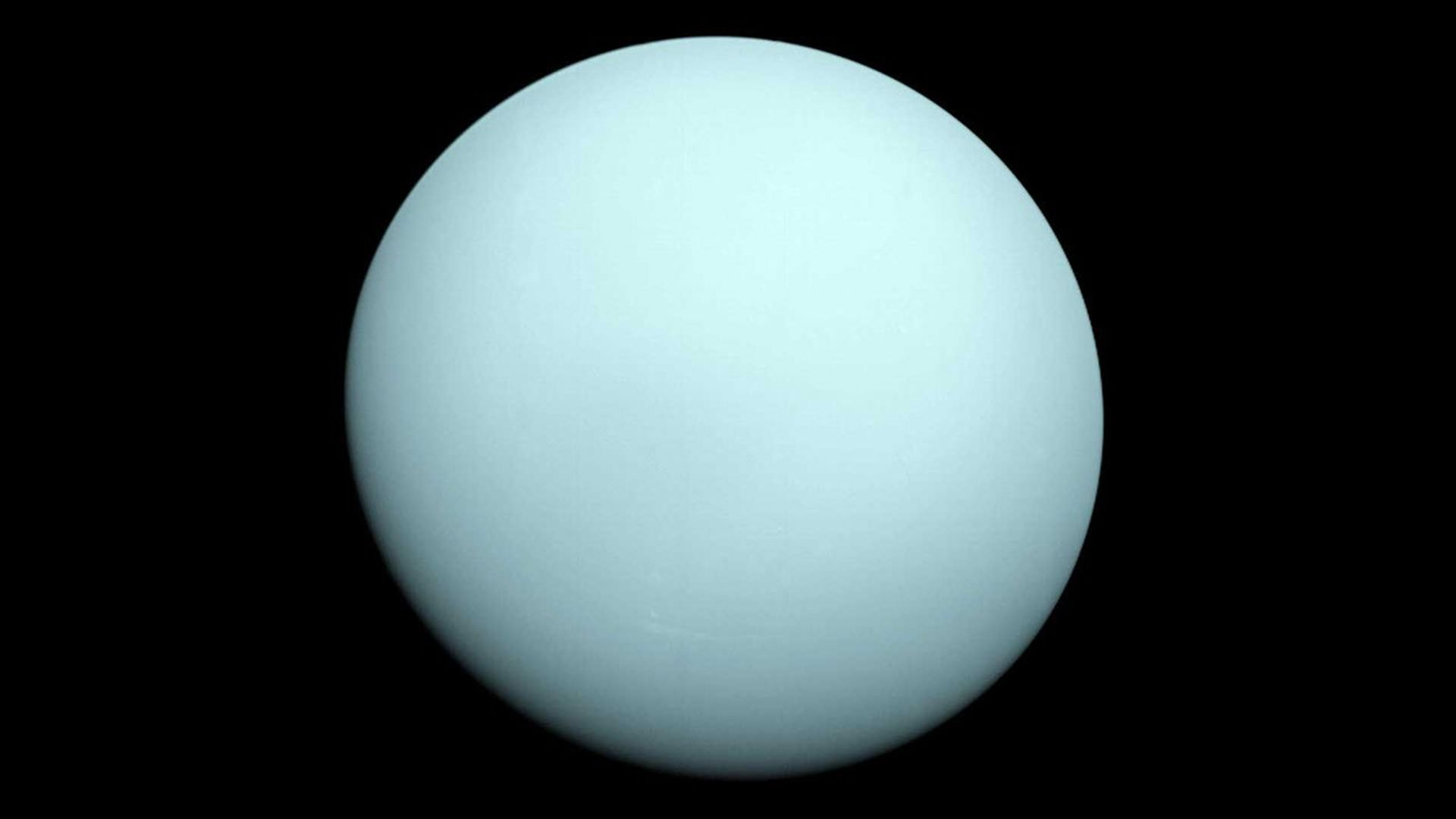 Uranus as a featureless pale blue-green disc